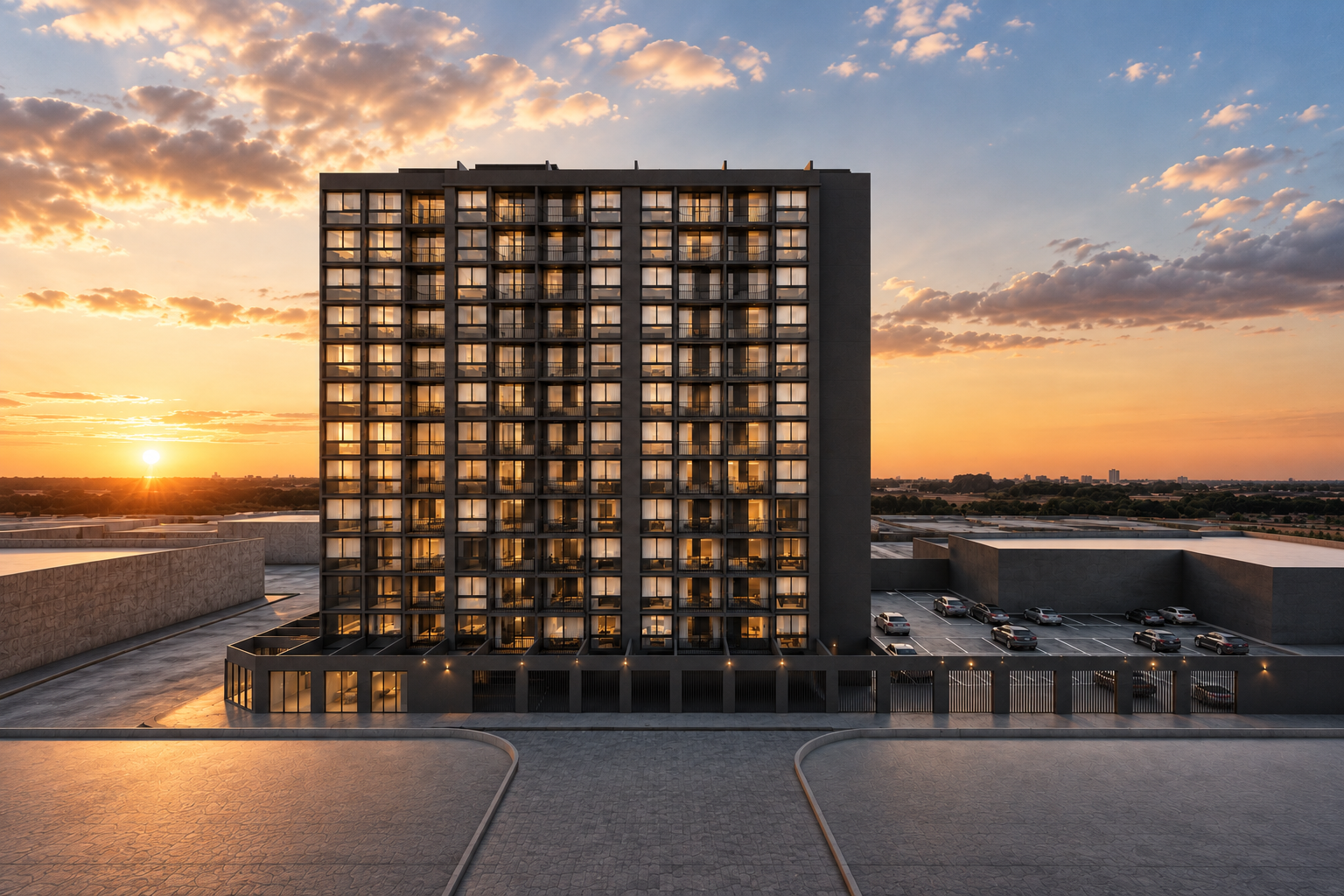 Edificio residencial enmarcado por la luz del atardecer, con cielo y suelo extendidos